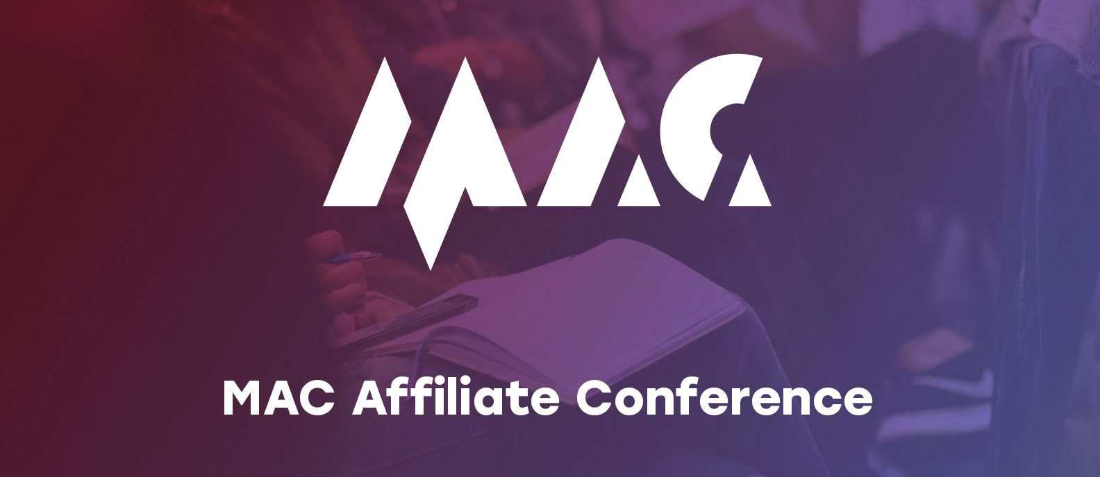 Exhibition hall at MAC Affiliate Conference 2025 in Yerevan, Armenia, with booths and affiliate marketers networking